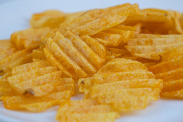 Beer snack chips on a white background close-up
