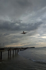 Airplane Landing Over The Sea 