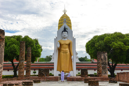 standing buddha image in thailand