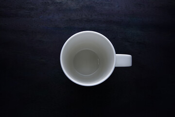 Coffee in white cup on black wooden table background, Black Coffee in white cup and on the gray wooden table, Top view