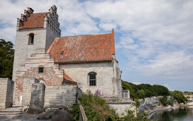Fototapeta na wymiar Old church with view out of the sea