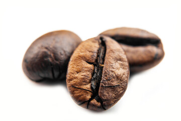 Macro Coffee beans on white background, roasted coffee beans isolated on white background. Close-up roasted coffee beans isolated on white background. Clipping path,with shadow