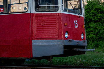 red old tram in the forest