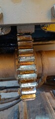 The old and dirty gear on machine