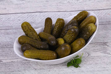 Pickled cucumbers heap in the bowl