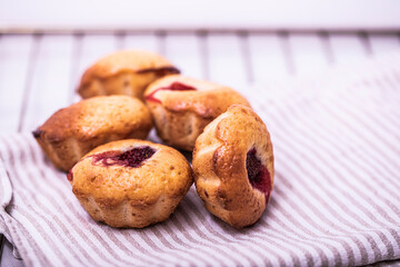 Basic muffin recipe. Banana strawberry oatmeal chip baked muffin cake on white background.
