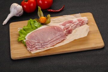 Raw pork bacon