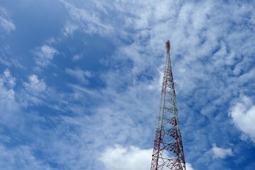 Radio communication towers against the sky backdrop