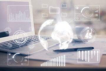 Forex graph hologram on table with computer background. Double exposure. Concept of financial markets.