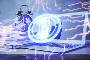 Double exposure of blockchain and crypto economy theme hologram and table with computer background....