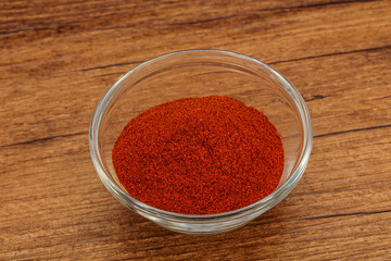 Dry paprika powder in the bowl