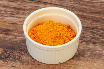 Tumeric powder in the bowl