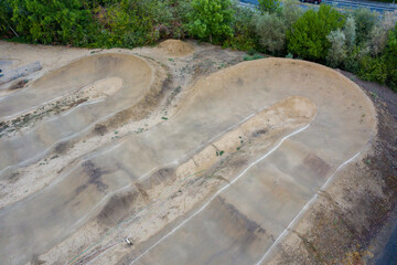 Aerial view of a dirt pump track for bicycles. 