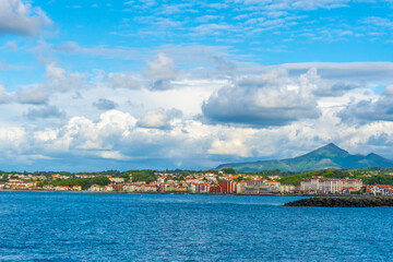 Fototapeta premium Panoramic view of the French town of Hendaye from the beautiful beach of Fuenterrabia, Gipuzkoa. Basque Country