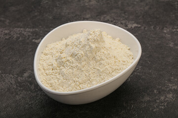 Wheat flour heap in the bowl