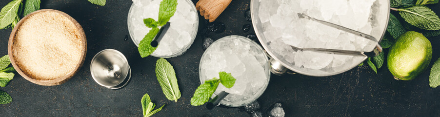 Metal ice bucket and mojito ingredients
