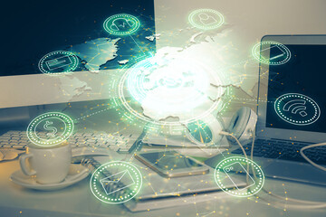 Computer on desktop with social network theme icon. Multi exposure. Concept of international connections.