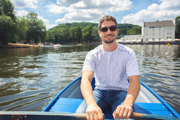 Man on a rowing boat background