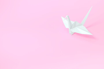 Origami Bird, bird paper crane on yellow background 3d rendering. 3d illustration bird paper craft for Hiroshima remembrance day minimal style concept.