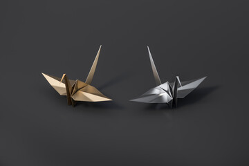 Gold and silver Origami Bird, bird paper crane on black background 3d rendering. 3d illustration pair of bird paper craft for Hiroshima remembrance day minimal style concept.