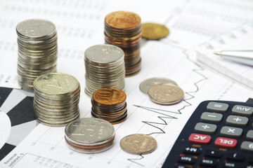 Russian coins with different economic graphs and charts