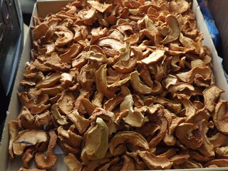 Dried fruits mixed and scattered among themselves on a cardboard