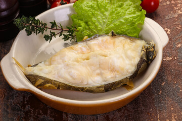 Baked wolffish steak