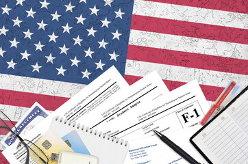USCIS form I-20 Certificate of eligibility for nonimmigrant student status lies on flat lay office table and ready to fill. U.S. Citizenship and Immigration services paperwork concept