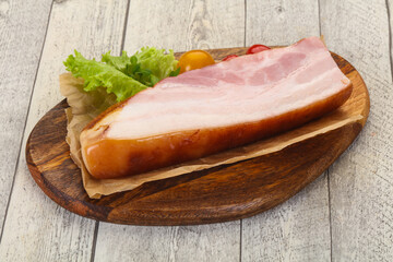 Smoked pork breast with salad leaves