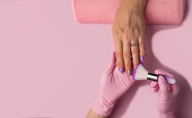 Selbstklebende Fototapeten Manicure process on pink background, top view.Manicure in beauty salon.Manicure concept,banner © bo.kvk