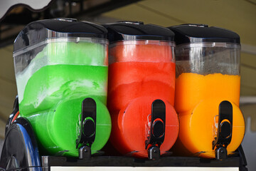 Colorful slush ice smoothies in machine