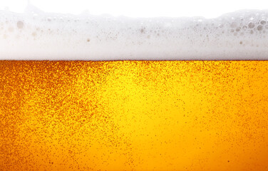 Close up background of beer with bubbles in glass