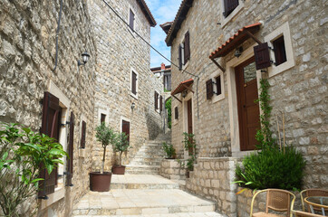One of the streets in the old city of Ulcinj in summer on a Sunny day. Montenegro