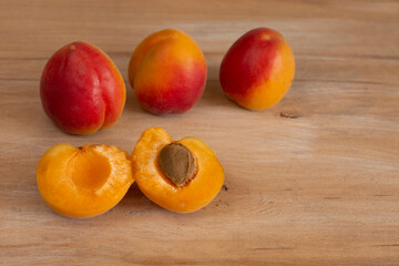 apricot berries on wooden background