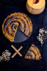 Healthy pumpkin pie with black background