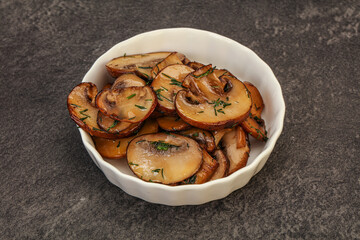 Roasted champignon with herbs and spices