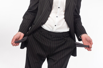 Poverty. A man without money. The man shows empty pockets. The collapse of the entire business. Loss of earnings. Loss of revenue source. A person needs money.