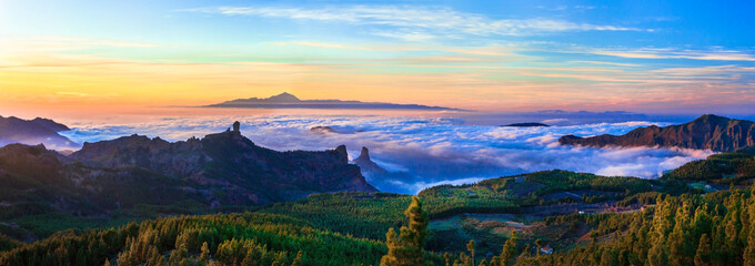 Grand Canary island. Mirador Roque Nublo . Breathtaking  mountains over sunset and view of Tenerife...