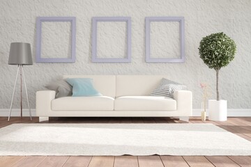 modern room with carpet,sofa,pillows,frames,plants and lamp
