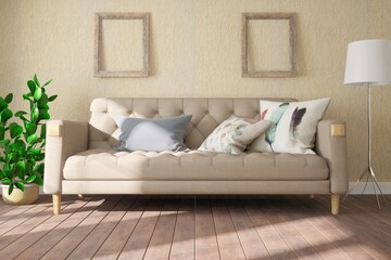 modern room with sofa,pillows,lamp,frames and plant in pot