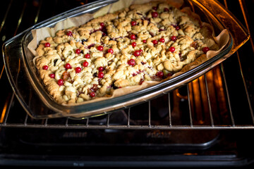 Appetizing homemade berry pie. Pie with red currants, gooseberries, black currants