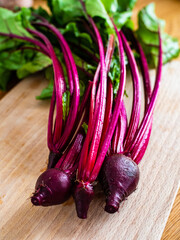 Raw beetroots on cutting board
