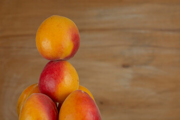apricot berries on wooden background