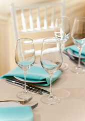 Beautifully decorated table setting at a wedding reception, birthday or Valentine's day. Floral decorations for the holiday.