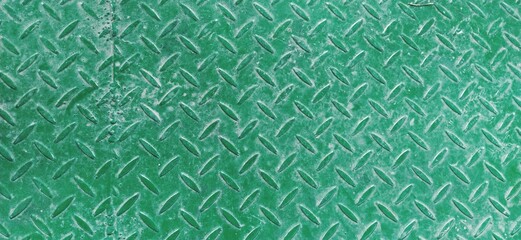 texture of fluted rusty iron metal plate background. Corrugated metal plate in green. Steel or iron...
