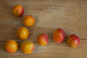 apricot berries on wooden background