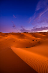 Dramtic and colorful sunrise at the Sahara desert: Earth's Largest Hot Desert