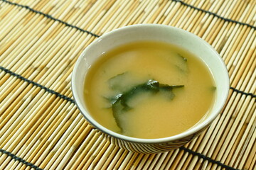 boiled soybean filling tofu and seaweed or miso soup Japanese food in cup