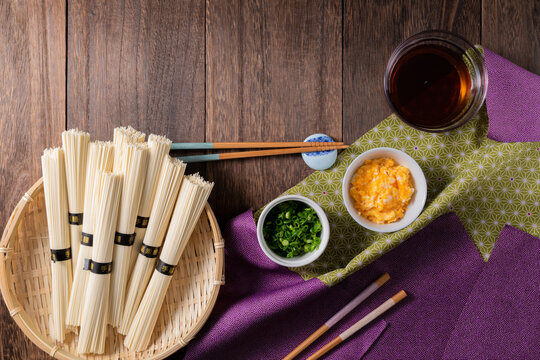 An ochugen (a gift for the elderly), somen noodles on a furoshiki plate, eggs and condiments