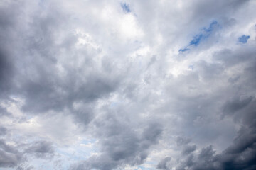 Beautiful dramatic colorful clouds on a blue sky at sunset